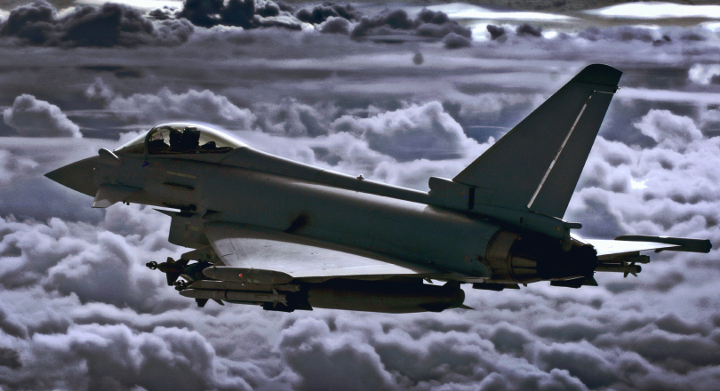 RAF Typhoon in flight in dramatic lighting